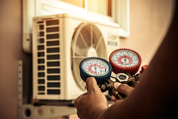 Professional Heat Pump Repair technician working in Greenville, MS